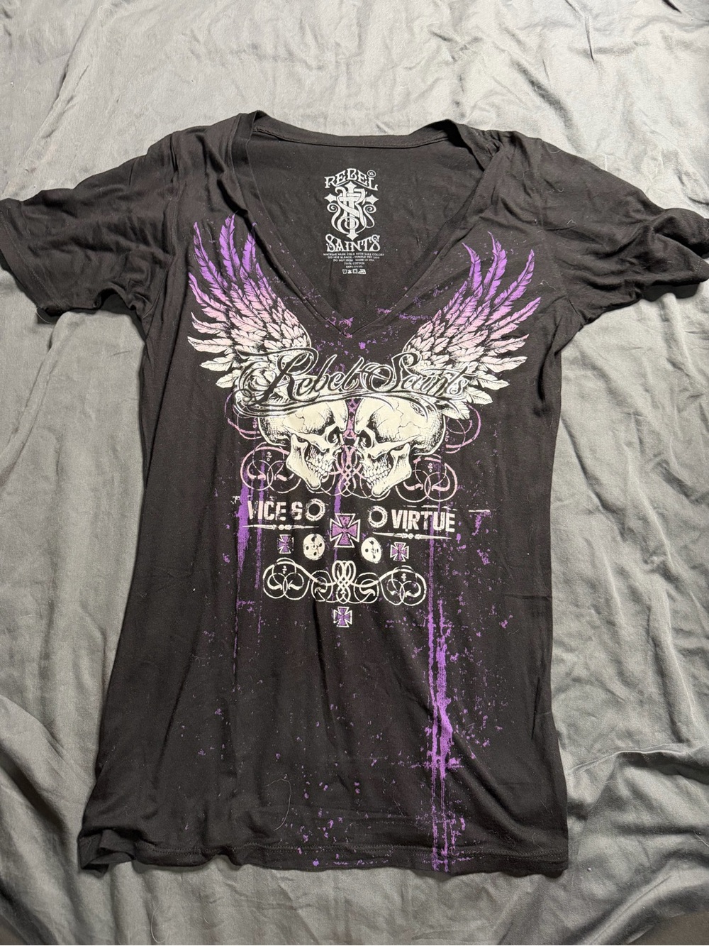 Rebel Saints Women’s Black V-Neck Tee with Purple Wing Graphic